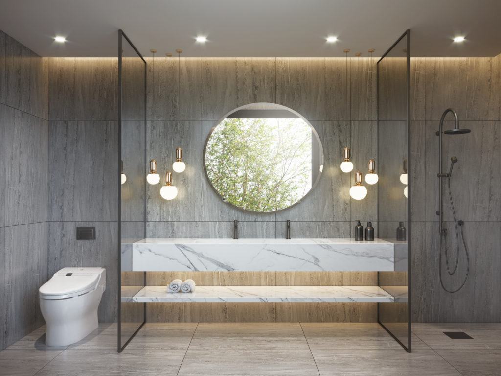 Modern bathroom with grey and white marble and hanging lamps